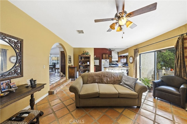 living room featuring ceiling fan