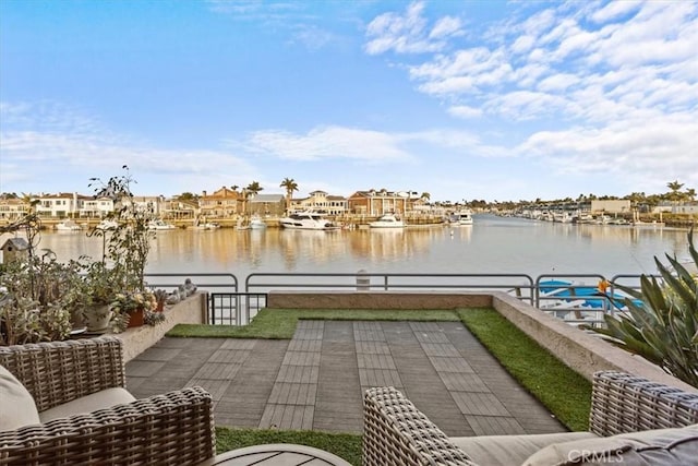 view of patio / terrace with a water view