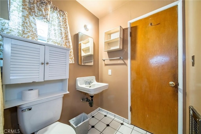 bathroom with sink and toilet