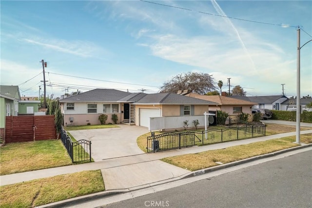 single story home with a garage and a front lawn