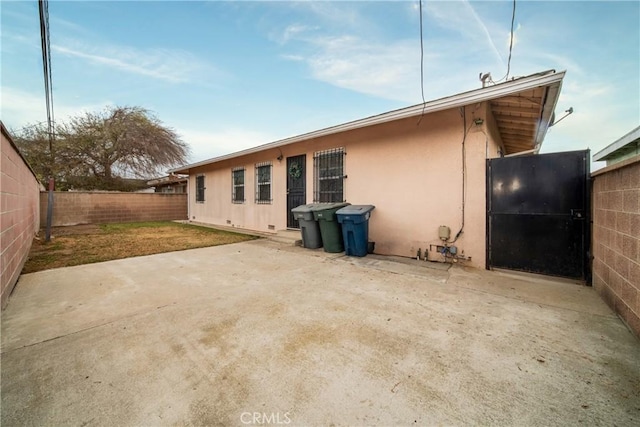 rear view of house with a patio area