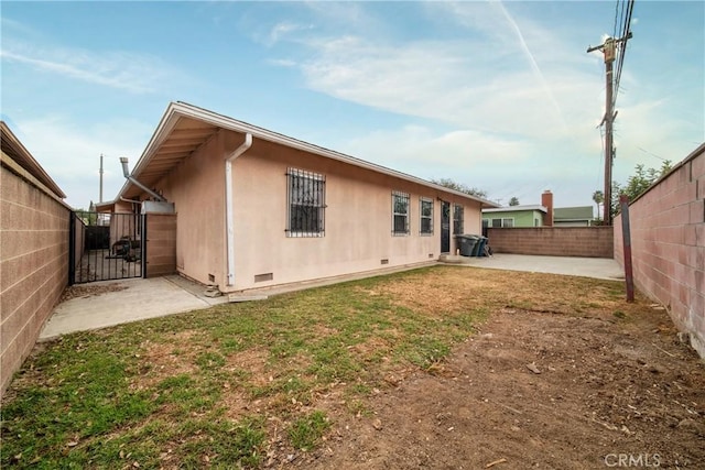 rear view of property with a patio area