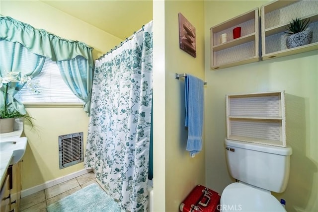 full bathroom featuring tile patterned flooring, vanity, shower / bath combination with curtain, and toilet