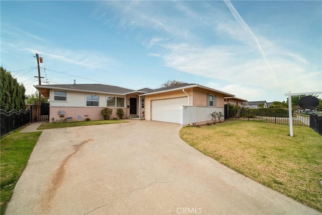 ranch-style house with a garage and a front yard