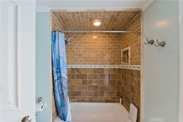 bathroom with shower / tub combo