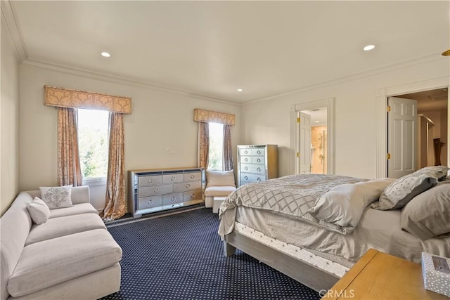 bedroom featuring recessed lighting, dark colored carpet, and ornamental molding
