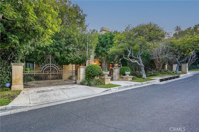 exterior space featuring a fenced front yard