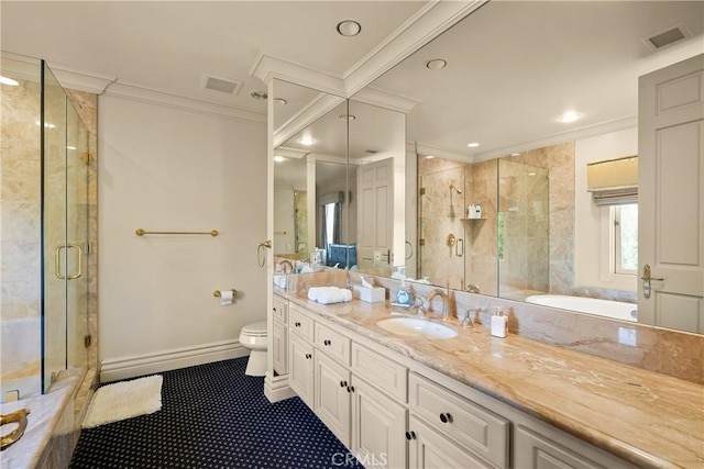 bathroom with a stall shower, vanity, toilet, ornamental molding, and visible vents