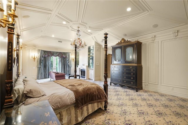 bedroom with ornamental molding and coffered ceiling