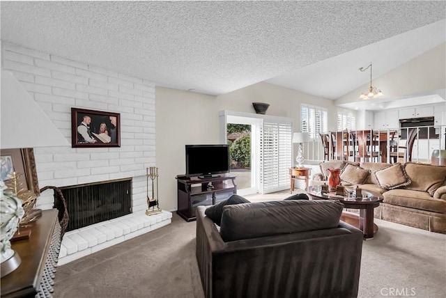 living room with a brick fireplace, carpet floors, lofted ceiling, and a textured ceiling