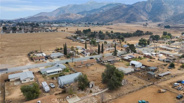 drone / aerial view featuring a mountain view