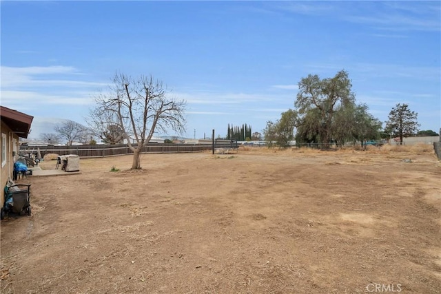 view of yard with a rural view