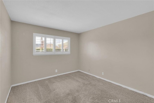 empty room with carpet floors