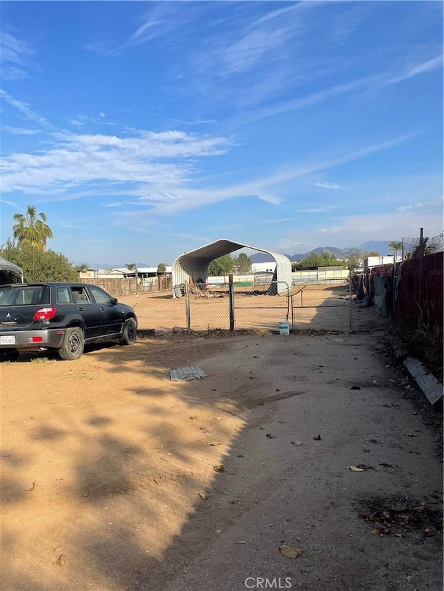 exterior space with a carport