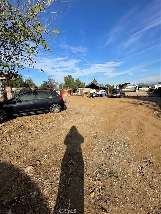 view of yard featuring a carport