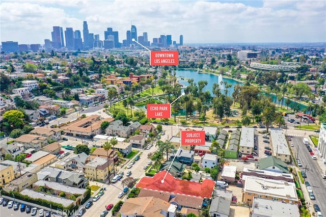 drone / aerial view featuring a water view