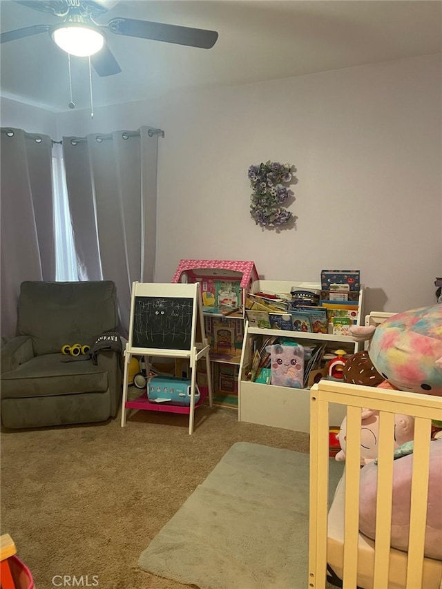 carpeted bedroom with ceiling fan