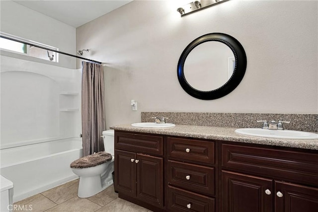 full bathroom with tile patterned floors, vanity, toilet, and shower / tub combo with curtain