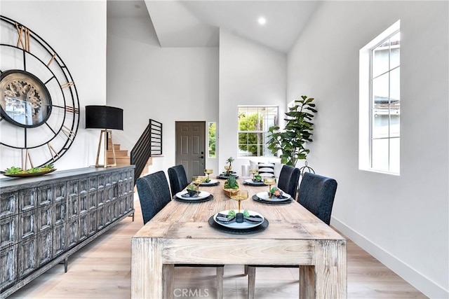 dining area with light hardwood / wood-style floors