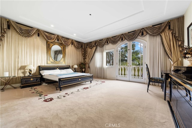 bedroom featuring french doors, carpet flooring, and access to outside