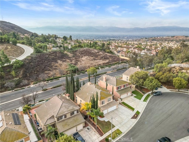 drone / aerial view featuring a mountain view