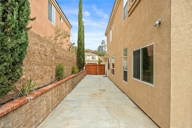 view of home's exterior featuring a patio