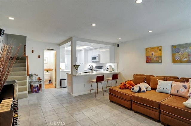 tiled living room with sink