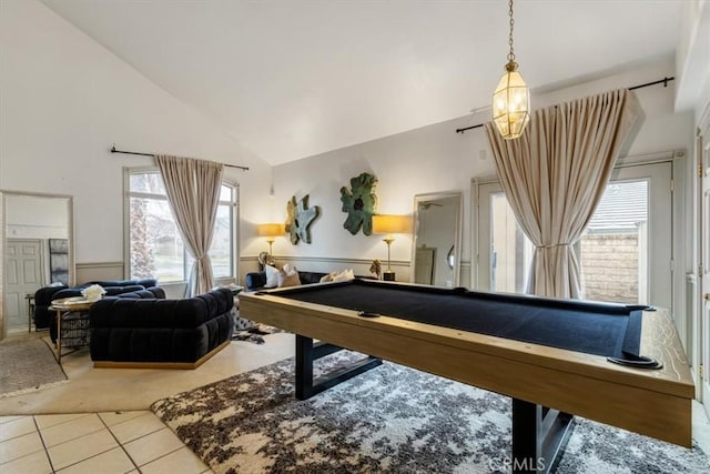 game room with high vaulted ceiling, pool table, and tile patterned floors