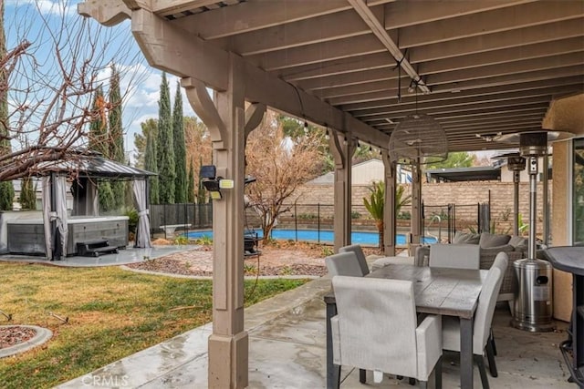 view of patio / terrace featuring a pool