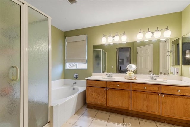 bathroom featuring vanity, tile patterned floors, and independent shower and bath