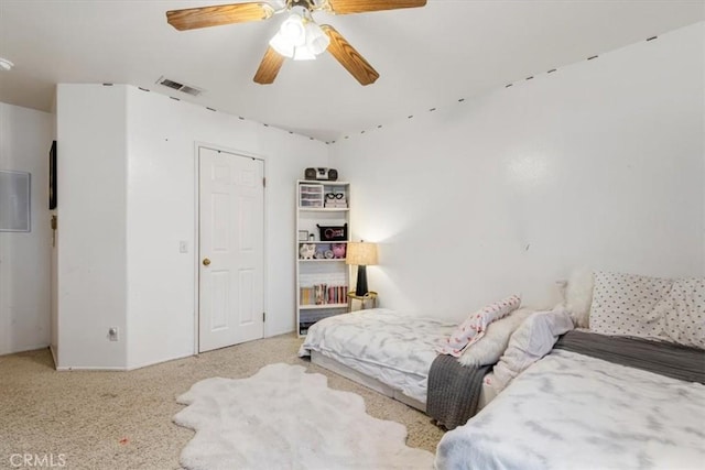 carpeted bedroom with ceiling fan