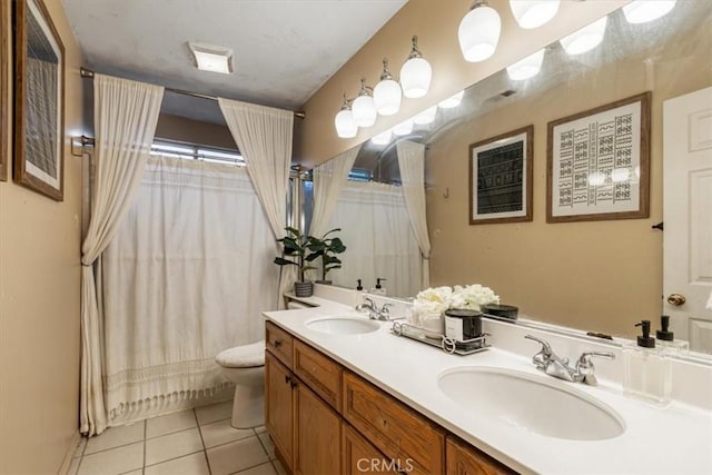 full bathroom featuring vanity, shower / tub combo, tile patterned floors, and toilet