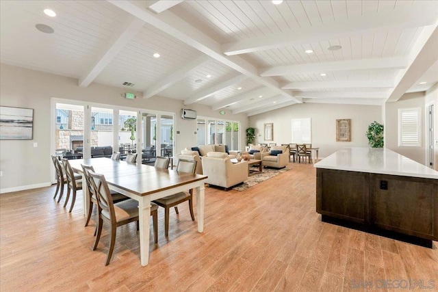 dining area with vaulted ceiling with beams, wood ceiling, and light hardwood / wood-style floors