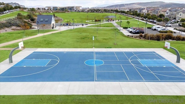 view of basketball court with a mountain view