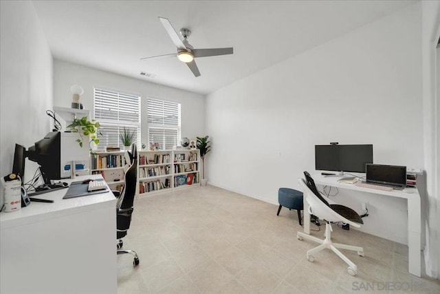 office space with ceiling fan