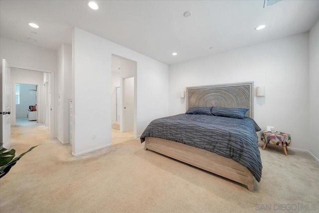 bedroom with light carpet