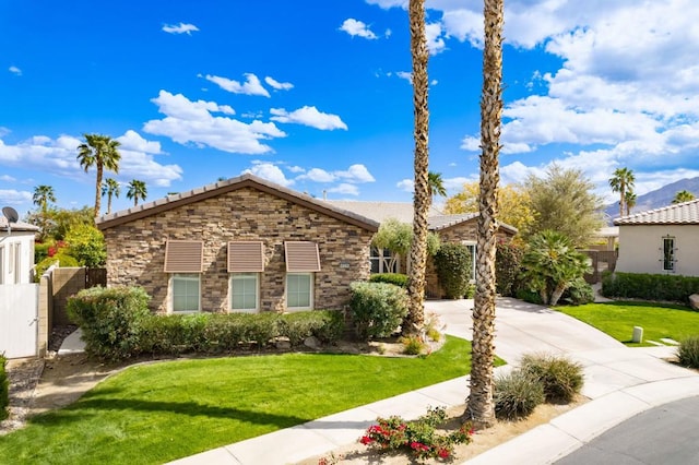 view of front of property with a front lawn