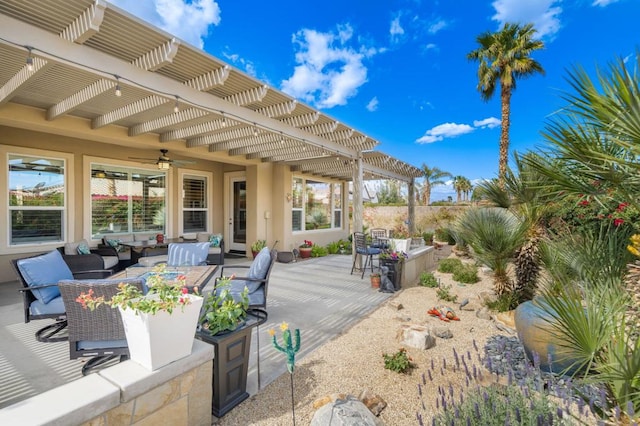 view of patio / terrace featuring an outdoor living space, a pergola, and ceiling fan