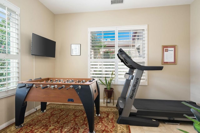 workout room with a healthy amount of sunlight