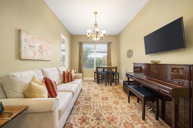 living room with light colored carpet and a chandelier