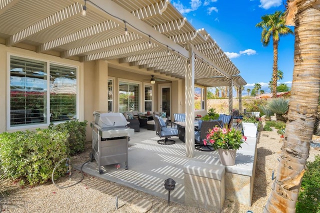 view of patio featuring area for grilling, a pergola, and outdoor lounge area