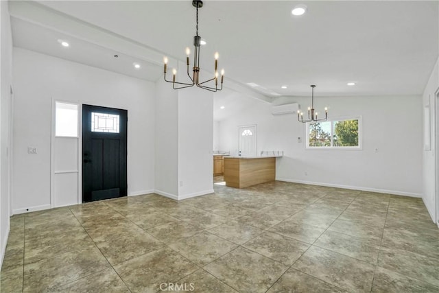 interior space with lofted ceiling with beams, a wall mounted AC, tile patterned floors, and an inviting chandelier