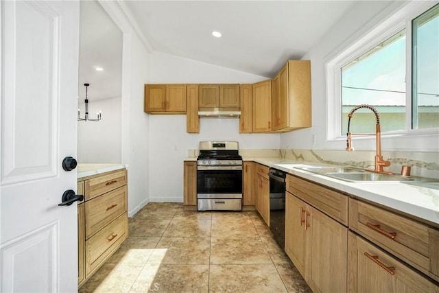 kitchen with vaulted ceiling, stainless steel gas stove, black dishwasher, sink, and light tile patterned floors