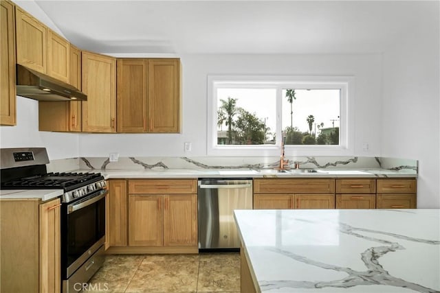 kitchen featuring appliances with stainless steel finishes and sink