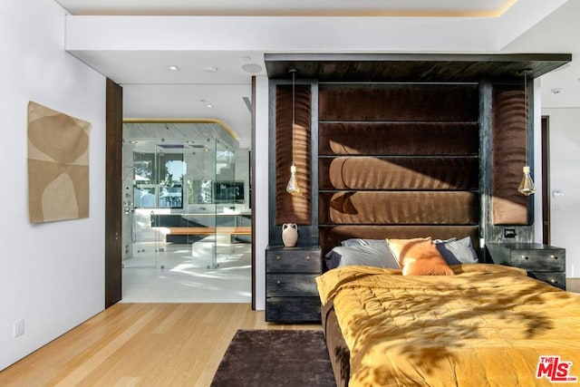 bedroom featuring wood-type flooring