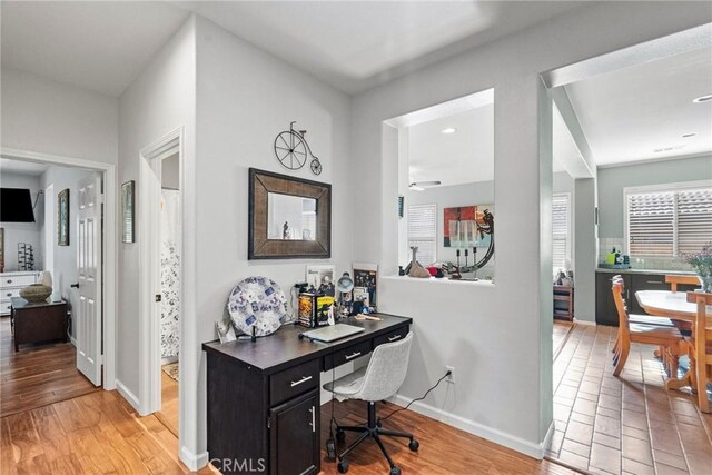 office space featuring hardwood / wood-style floors