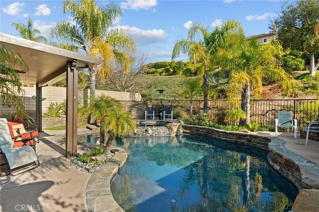 view of swimming pool featuring a patio