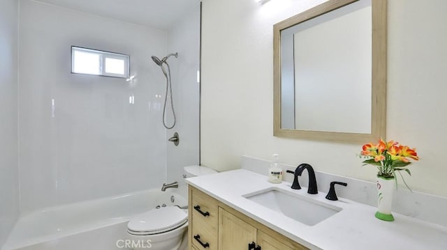 full bathroom with shower / bathing tub combination, vanity, and toilet