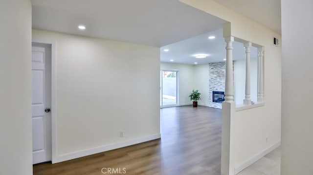 hall with hardwood / wood-style floors