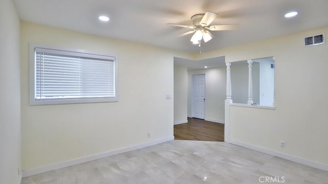 unfurnished room with ceiling fan